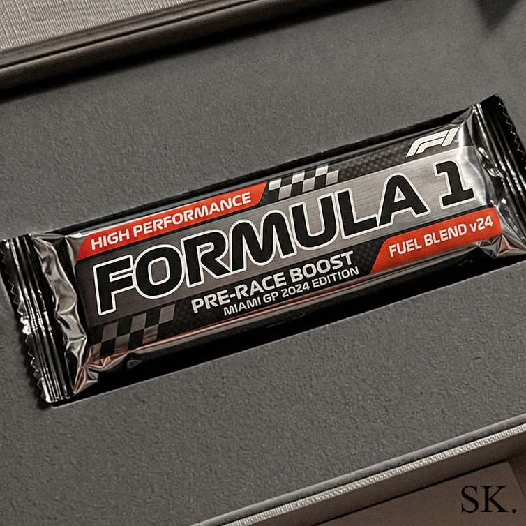 Close-up of a Formula 1 Pre-Race Boost energy bar, Miami GP 2024 Edition, with racing-inspired branding.